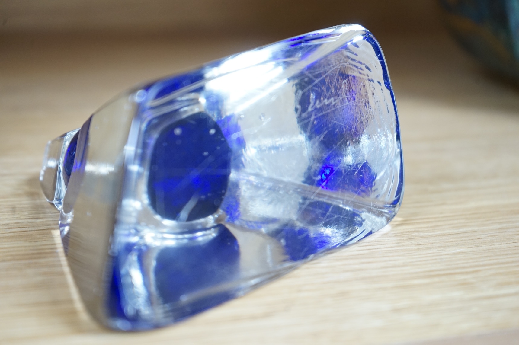 A collection of glassware including a Kosta Boda snowball pot and an Evian advertising water bottle, largest 23cm high